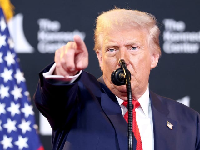 U.S. President Donald Trump takes a question from the press during a visit to the Kennedy Center in Washington, D.C., U.S., August 13, 2025.  REUTERS/Kevin Lamarque