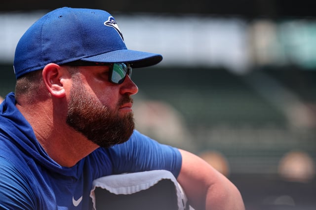 BALTIMORE, MD - JULY 29: Manager John Schneider #14 of the Toronto Blue Jays looks on during the third inning in game one of a split doubleheader against the Baltimore Orioles at Oriole Park at Camden Yards on July 29, 2025 in Baltimore, Maryland.