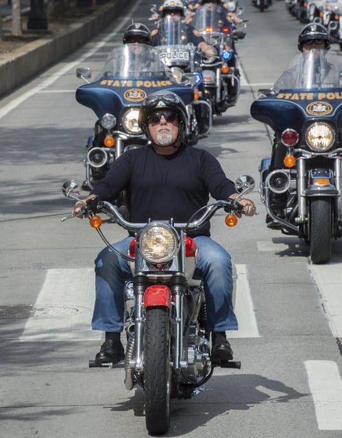 FILE - Billy Joel leads riders in the 9/11 Memorial Motorcycle Ride in New York on Sept. 11, 2015. (AP Photo/Bryan R. Smith, file)