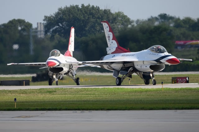 A pair of U.S. Air Force Thunderbird F-16 Fighting Falcons taxi from the Gary Chicago International Airport runway during a preview event for the upcoming Gary Air Show on Thursday, Aug. 7, 2025. (Kyle Telechan/for the Post-Tribune)