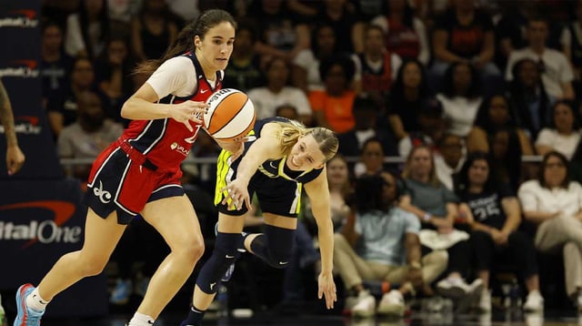 Jun 22, 2025; Washington, District of Columbia, USA; Washington Mystics guard Sonia Citron (22) steals the ball from Dallas Wings guard Paige Bueckers (5) in the second half at Entertainment &amp; Sports Arena. Mandatory Credit: Geoff Burke-Imagn Images