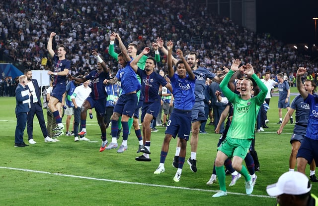 Soccer Football - UEFA Super Cup - Final - Paris St Germain v Tottenham Hotspur - Bluenergy Stadium, Udine, Italy - August 13, 2025 Paris Saint Germain players celebrate after winning the UEFA Super Cup REUTERS/Guglielmo Mangiapane
