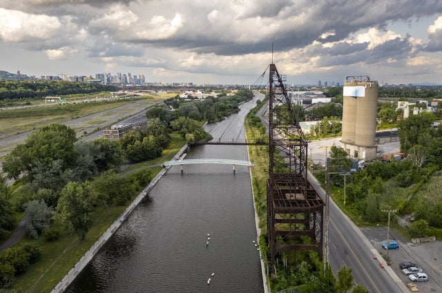 An aerial view of the Lachine Canal, a 14.5-kilometre waterway that runs from the Saint Lawrence River at the Port of Montreal to Lake Saint Louis, in Montreal on Sunday, July 20, 2025. THE CANADIAN PRESS/Christinne Muschi