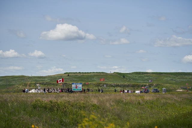 Manitoba Premier Wab Kinew says a preliminary search of a Winnipeg landfill for the remains of a slain First Nations woman has begun. Activists for Indigenous rights blockade the main road into the Brady Road landfill, Monday, July 10, 2023. THE CANADIAN PRESS/David Lipnowski