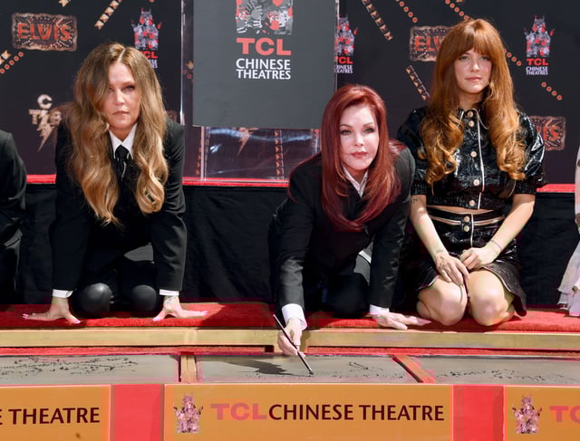 Lisa Marie Presley, Priscilla Presley and Riley Keough cement their handprints outside the TCL Chinese Theatre on June 21, 2022, in Hollywood, California.