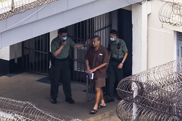Jimmy Lai walks through the Stanley prison in Hong Kong on July 28, 2023.