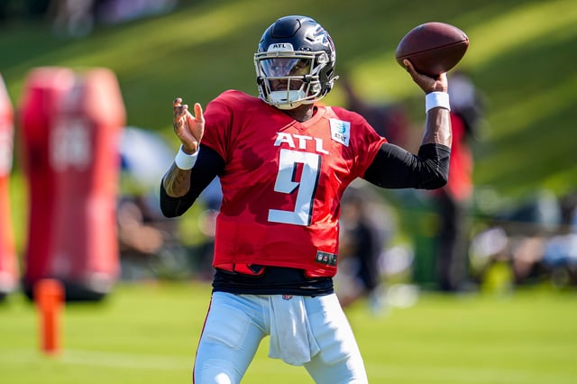 Atlanta Falcons quarterback Michael Penix Jr. passes the ball during a July practice.