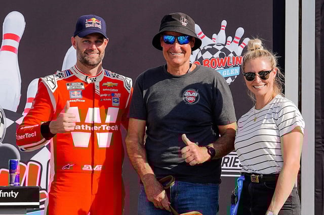 Shane van Gisbergen with his father Robert van Gisbergen (middle) and partner Jessica Dane (right).