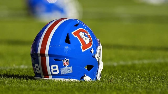 Jan 5, 2025; Denver, Colorado, USA; General view of the helmet worn by Denver Broncos defensive end John Franklin-Myers (98) (not pictured) before the game against the Kansas City Chiefs at Empower Field at Mile High. Mandatory Credit: Ron Chenoy-Imagn Images