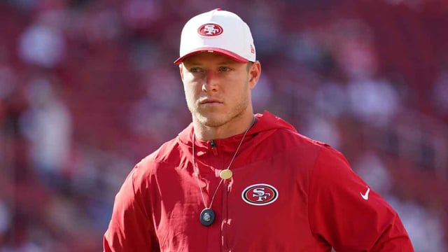 Aug 9, 2025; Santa Clara, California, USA; San Francisco 49ers running back Christian McCaffrey (23) watches warm ups before the game against the Denver Broncos at Levi&#39;s Stadium. Mandatory Credit: David Gonzales-Imagn Images