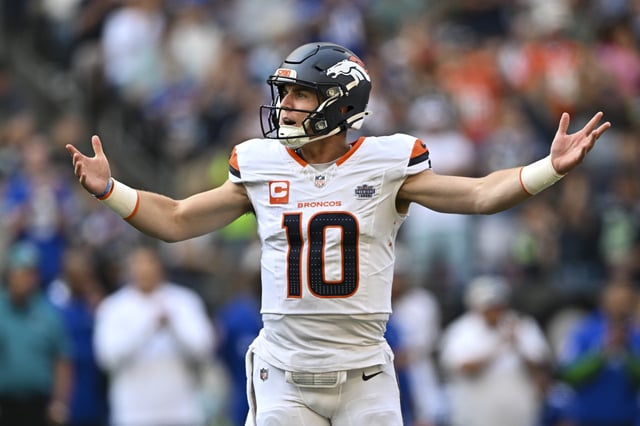 Bo Nix #10 of the Denver Broncos gestures during the game against the Seattle Seahawks at Lumen Field on September 08, 2024 in Seattle, Washington.