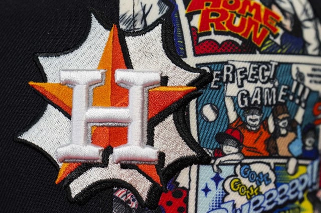 An Astros baseball cap themed as a comic book is seen before an MLB baseball game in Houston, Wednesday, Aug. 13, 2025.