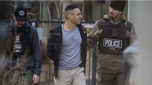 Albuquerque SWAT officers take Solomon Peña into custody Monday in Southwest Albuquerque. Photo: Roberto E. Rosales/Albuquerque Journal