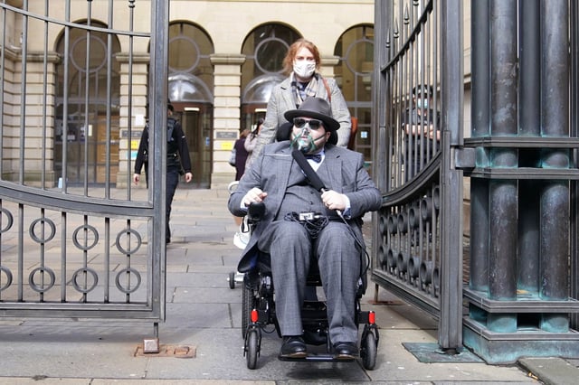 The defendant authorities believe to be Nicholas Rossi, alias Nicholas Alahverdian, leaves Edinburgh Sheriff And Justice Of The Peace Court, in Edinburgh, Scotland, on April 7, 2022.