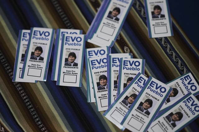 Stickers of former President Evo Morales sit on a table at a campaign center for supporters in favor of a null vote in the upcoming presidential elections in El Alto, Bolivia, Tuesday, Aug. 12, 2025. (AP Photo/Natacha Pisarenko)