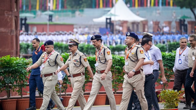 Delhi Police Commissioner S.B.K. Singh, along with other senior police officers, conducts a security inspection during the full dress rehearsal for the 79th Independence Day celebrations at the Red Fort complex in New Delhi on Wednesday. 