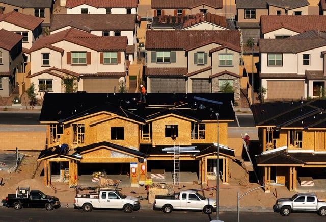 In an aerial view, homes are seen under construction at a new housing development on August 08, 2025, in Henderson, Nevada.