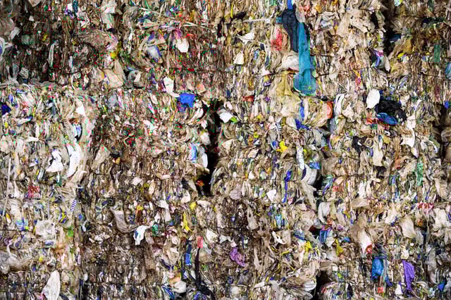 Stacked bundles of plastic trash lie at the waste sorting plant of recycling company Remondis in Erftstadt, Germany, August 12, 2025. REUTERS/Jana Rodenbusch/File Photo