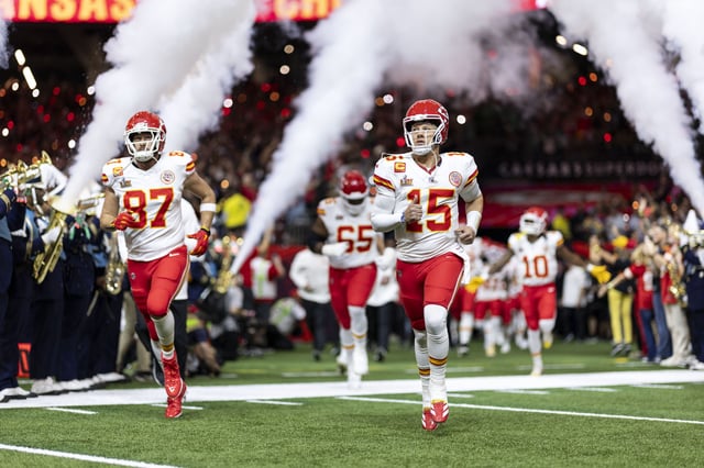 Patrick Mahomes #15 of the Kansas City Chiefs and Kansas City Chiefs tight end Travis Kelce (87) take the field prior to Super Bowl LIX against the Philadelphia Eagles at Caesars Superdome on February 09, 2025 in New Orleans, Louisiana.