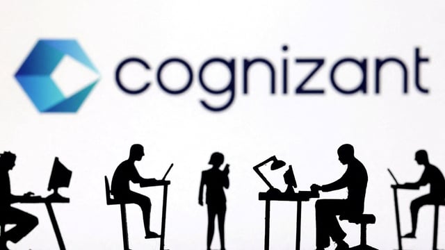 Figurines with computers and smartphones are seen in front of Cognizant's logo in this illustration taken