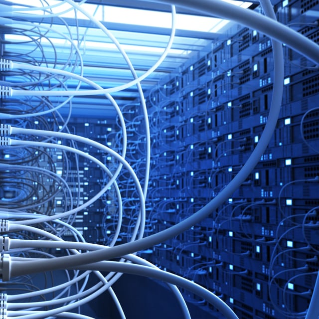 An artistic 3D render of the inside of a data centre, with many network cables criss-crossing the server racks. The entire image is bathed in blue light.