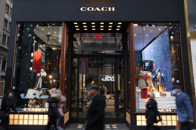 A view of a Coach store, a brand owned by Tapestry, Inc., in Manhattan, New York, U.S., November 15, 2021. REUTERS/Andrew Kelly/File Photo