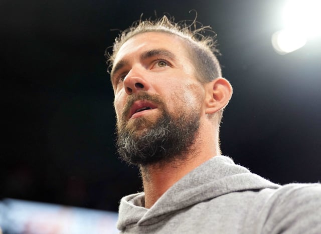 Apr 5, 2024; Phoenix, Arizona, USA; Olympic gold medal swimmer Michael Phelps looks on during the first half of the game between the Phoenix Suns and the Minnesota Timberwolves at Footprint Center. Mandatory Credit: Joe Camporeale-USA TODAY Sports/File Photo