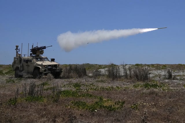 FILE - A US Marine Air Defense Integrated System, or MADIS, fires at a drone during a live-fire joint Philippines US military exercise at the Philippine Navy training camp in San Antonio, Zambales province, northern Philippines Sunday, April 27, 2025. (AP Photo/Aaron Favila, File)