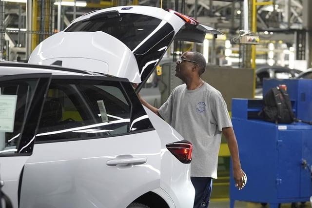 A Ford vehicle is shown on the assembly line at the Ford Louisville Assembly Plant, Monday, Aug. 11, 2025, in Louisville, Ky. (AP Photo/Darron Cummings)