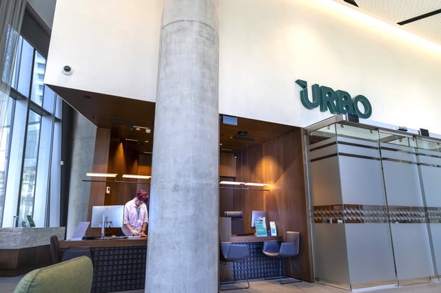 An employee works in the operations department of Lithuanian UAB Urbo Bankas, which was imposed sanctions by the Chinese Ministry of Commerce on Wednesday, in Vilnius, Lithuania, Thursday, Aug. 14, 2025. (AP Photo/Mindaugas Kulbis)