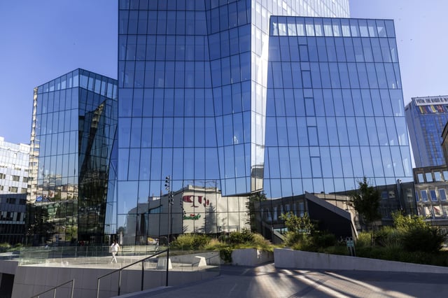 The building that houses on its ground floor, the Lithuanian bank UAB "Urbo bankas" which was imposed sanctions by the Chinese Ministry of Commerce, in Vilnius, Lithuania, Thursday, Aug. 14, 2025. (AP Photo/Mindaugas Kulbis)