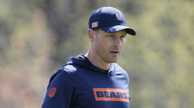 May 10, 2025; Lake Forest, IL, USA; Chicago Bears head coach Ben Johnson walks the field during rookie minicamp at Halas Hall. Mandatory Credit: David Banks-Imagn Images
