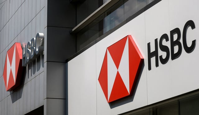 Two HSBC bank logos are displayed on an office building in Mexico City, Mexico, July 25, 2025. REUTERS/Henry Romero/File Photo