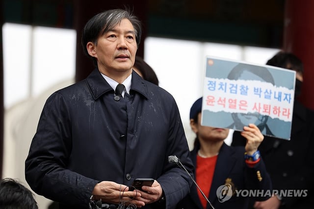 In this file photo, Cho Kuk, a scandal-ridden former justice minister, answers reporters' questions after visiting the May 18 National Cemetery in Gwangju, 267 kilometers south of Seoul, on Feb. 14, 2024, one day after he announced a plan to create a new political party to run in the April 10 general elections. (Yonhap)