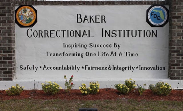 This undated image provided by the Florida Department of Corrections shows signage for the Baker Correctional Institution, a state prison about 43 miles west of downtown Jacksonville, Florida.