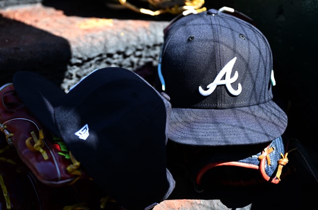 WASHINGTON, DC - APRIL 02: A view of a Atlanta Braves baseball cap in the dugout during the game between the Washington Nationals and the Atlanta Braves at Nationals Park on April 02, 2023 in Washington, DC. (Photo by G Fiume/Getty Images)