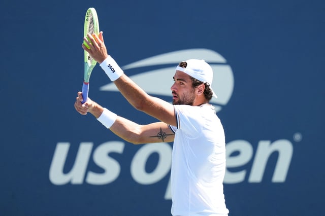 Aug 31, 2023; Flushing, NY, USA; Matteo Berrettini of Italy serves to Arthur Rinderknech of France on day four of the 2023 U.S. Open tennis tournament at USTA Billie Jean King National Tennis Center. Mandatory Credit: Danielle Parhizkaran-USA TODAY Sports/File Photo