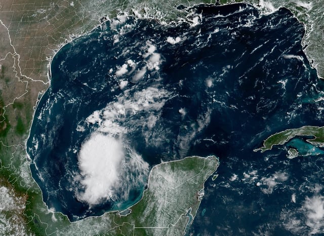 Shown is Invest 98L in the southern Gulf of Mexico. The system is starting to become better organized, an it has a low chance to become Tropical Storm Fernand in the next 24 to 30 hours.