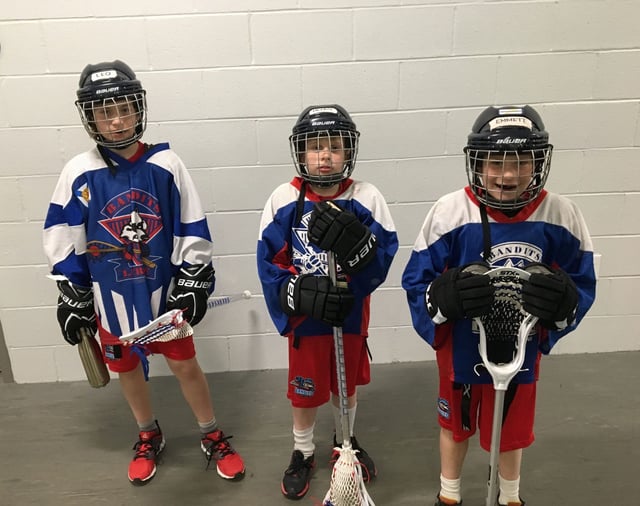  The Mont brothers, from left, Leo, Henry and Emmett in their first year of playing lacrosse in 2018.