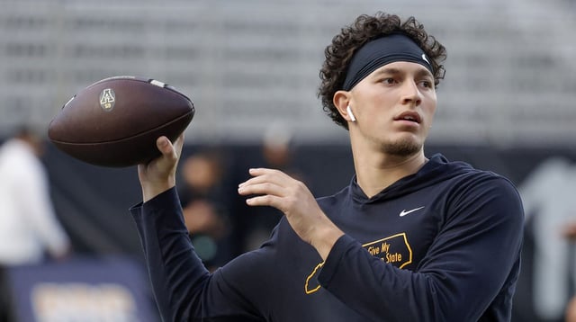 Sep 19, 2024; Boone, North Carolina, USA; Appalachian State Mountaineers quarterback Joey Aguilar (4) throws a warmup pass before the game against the South Alabama Jaguars at Kidd Brewer Stadium. Mandatory Credit: Reinhold Matay-Imagn Images