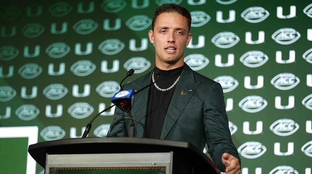Jul 22, 2025; Charlotte, NC, USA; Miami quarterback Carson Beck answers questions from the media during ACC Media Days at Hilton Charlotte Uptown. Mandatory Credit: Jim Dedmon-Imagn Images