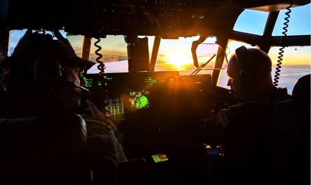 U.S. Air Force 102nd Rescue Squadron evaluator pilots check the control panel of an HC-130J Super Hercules as they fly from Ämari Air Base, Estonia, to Aviano Air Base, Italy on Jan. 26, 2024 (U.S. Air Force Photo)