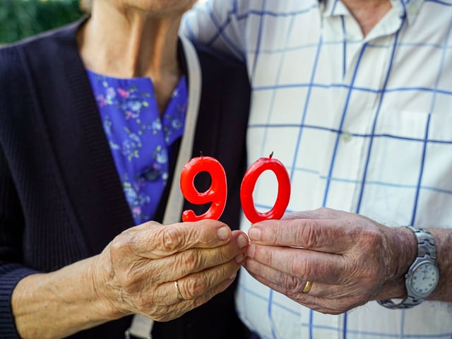 elderly couple celebrating 90th birthday together. 90 years anniversary in the old age