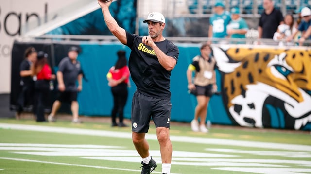 Aug 9, 2025; Jacksonville, Florida, USA; Pittsburgh Steelers quarterback Aaron Rodgers (8) throws during warm ups before a preseason game against the Jacksonville Jaguars at EverBank Stadium. Mandatory Credit: Travis Register-Imagn Images