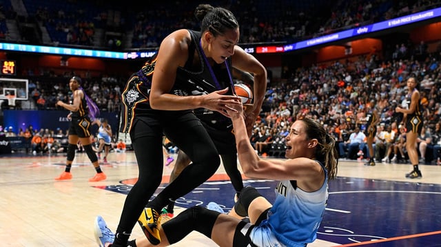 Sun guard Bria Hartley (14) and Chicago Sky guard Rebecca Allen (9) draw technical fouls and ejections from the game during the first half at Mohegan Sun Arena
