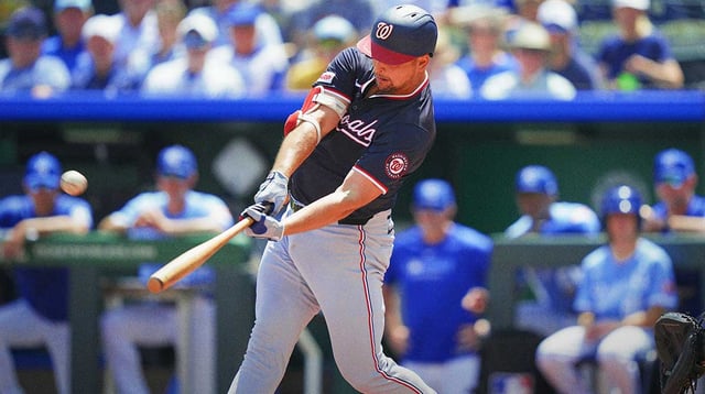 Aug 13, 2025; Kansas City, Missouri, USA; Washington Nationals first baseman Nathaniel Lowe (33) hits a grand slam during the first inning against the Kansas City Royals at Kauffman Stadium. Mandatory Credit: Jay Biggerstaff-Imagn Images