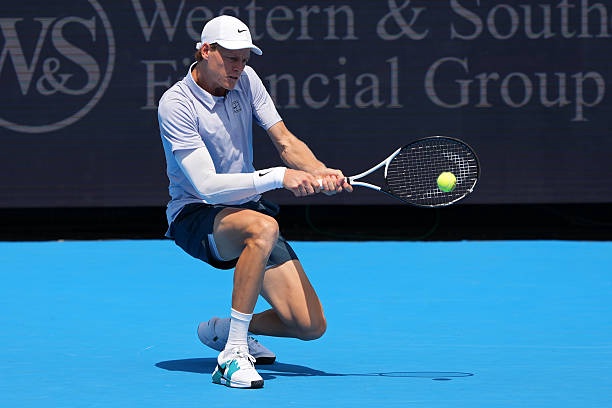 MASON, OHIO - AUGUST 13: Jannik Sinner of Italy plays a backhand during the match against Adrian Mannarino of France during Day 7 of the Cincinnati Open at the Lindner Family Tennis Center on August 13, 2025 in Mason, Ohio. (Photo by Dylan Buell/Getty Images)