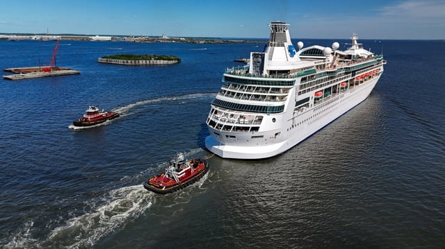 The Vicki McAllister (left) turns back to port as the Bridget McAllister prepares to release after the pair of tugs escorted Royal Caribbean’s Vision of the Seas out of port and safely through the Francis Scott Key Bridge collapse site. (Jerry Jackson/Staff)