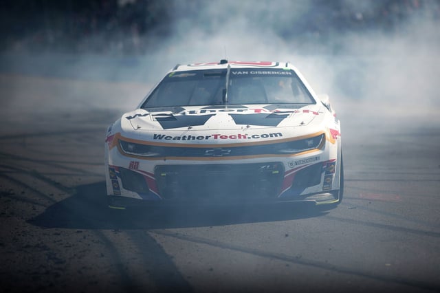 Shane Van Gisbergen, driver of the #88 WeatherTech Chevrolet, celebrates with a burnout after winning the NASCAR Cup Series Go Bowling at The Glen at Watkins Glen. Image: Chris Graythen/Getty Images