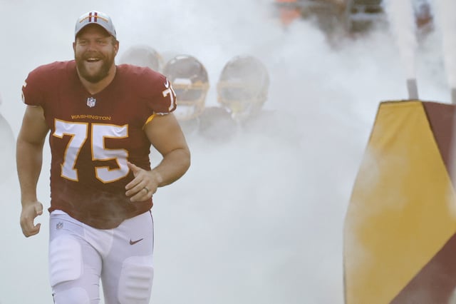 Aug 28, 2021; Landover, Maryland, USA; Washington Football Team guard Brandon Scherff (75) runs onto the field prior to their game against the Baltimore Ravens at FedExField. Mandatory Credit: Geoff Burke-USA TODAY Sports/File Photo